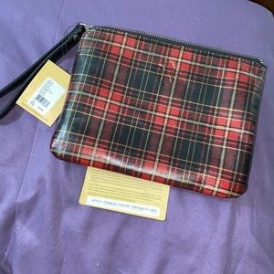 New with tags large Patricia Nash wristlet along with box